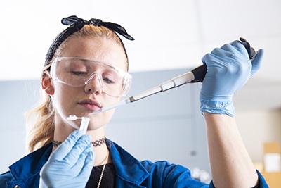 student in chemistry lab