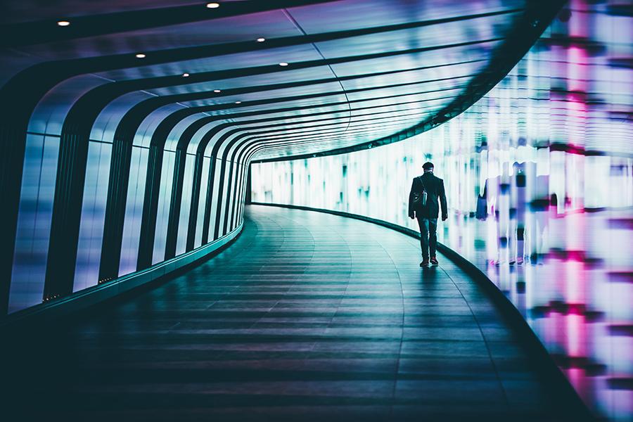 pathway in tunnel with person walking